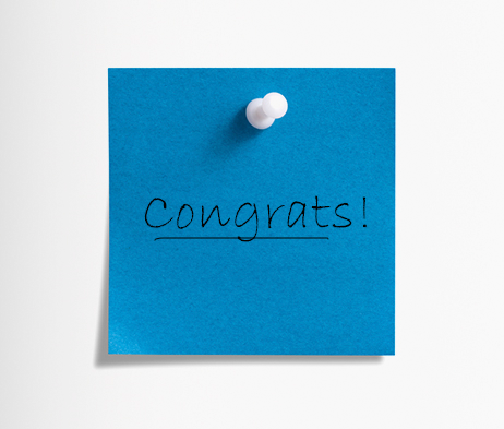 Sticky-note with hand-written words,"Congrats."