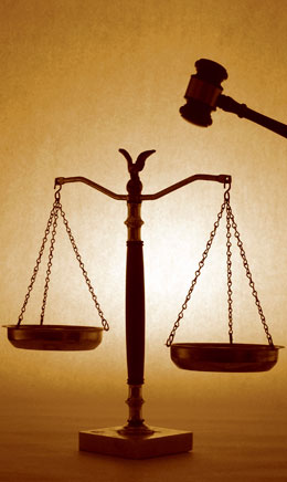 a gavel and a scale as symbols for law